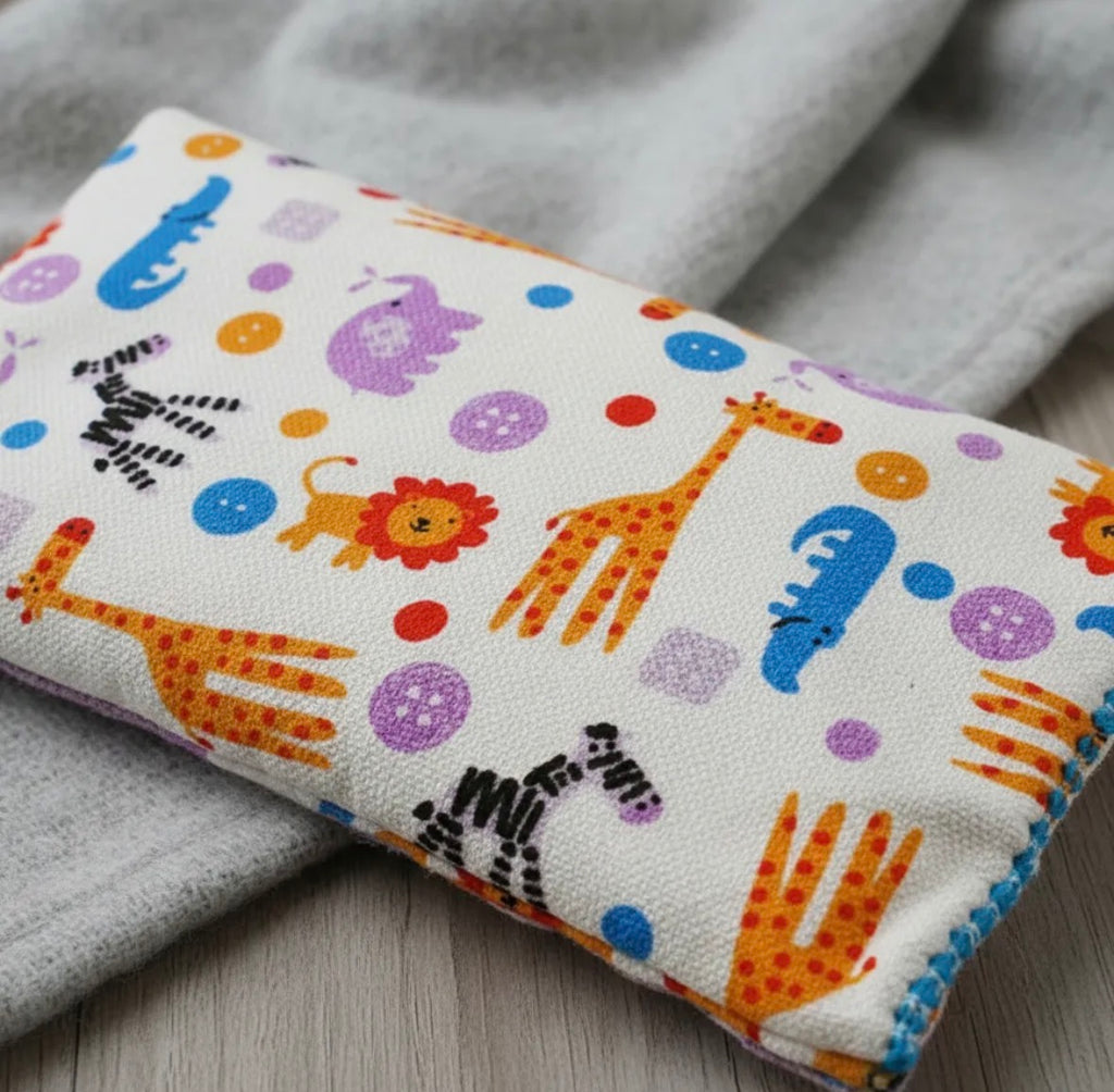compresa térmica infantil mediana con funda lavable y semillas naturales